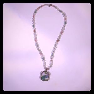 Neutral hand painted pendant necklace.